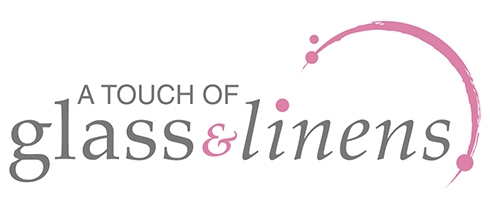 A Touch of Linens and Glass Logo